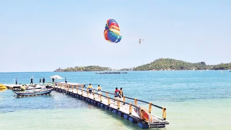 Visitors enjoy paragliding at Hai Bo Dap in the Nam Du archipelago.