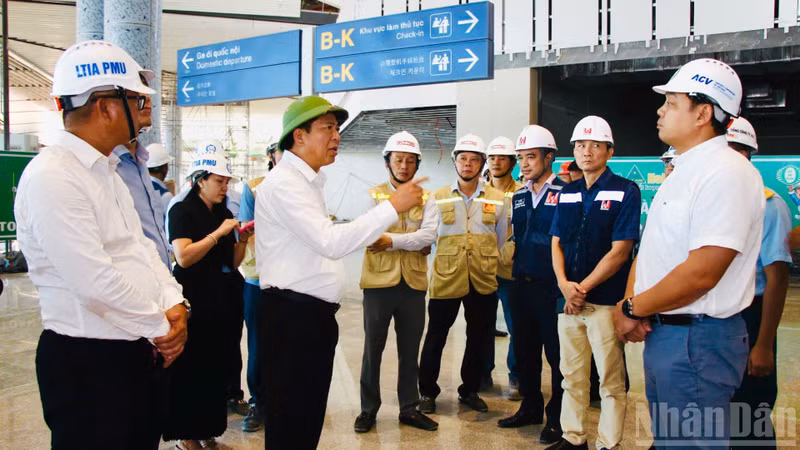 Minister of Construction Tran Hong Minh inspects progress at the Long Thanh Airport project on June 13.