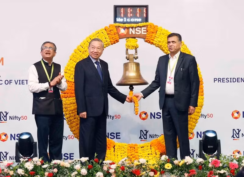 General Secretary and President To Lam rings the bell to open the trading session of the National Stock Exchange of India (NSE).