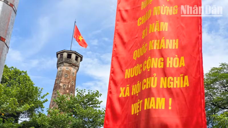 The national flag flies atop the Ha Noi Flag Tower, a historic landmark that has witnessed many milestones in the capital’s history. (Photo: Minh Duy)
