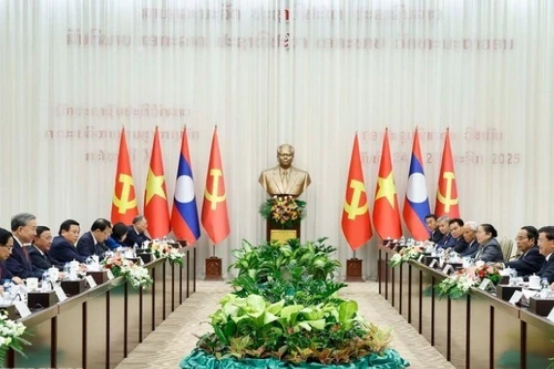 General Secretary To Lam and General Secretary and President of Laos Thongloun Sisoulith co-chaired the high-level meeting between the CPV and the LPRP. (Photo: Thong Nhat/VNA)