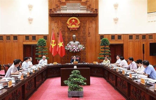Prime Minister Pham Minh Chinh (C) chairs a meeting of the Government Party Committee’s Standing Board on July 1. (Photo: VNA) Prime Minister Pham Minh Chinh (C) chairs a meeting of the Government Party Committee’s Standing Board on July 1. (Photo: VNA)