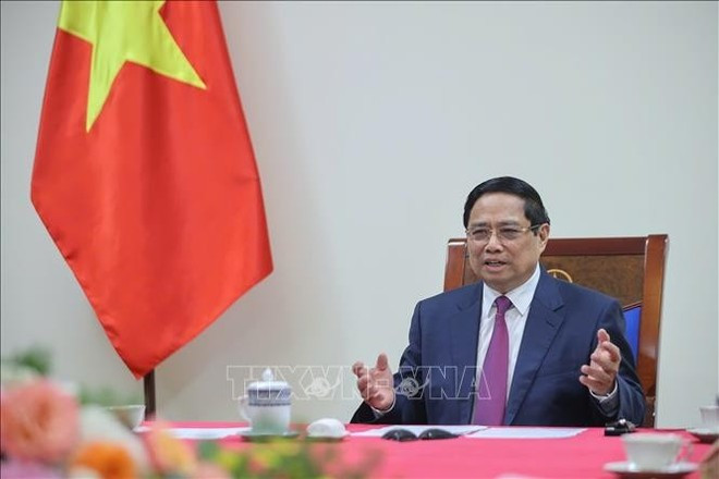 Vietnamese Prime Minister Pham Minh Chinh holds phone talks with his Cambodian counterpart Hun Manet on August 15 afternoon. (Photo: VNA) Vietnamese Prime Minister Pham Minh Chinh holds phone talks with his Cambodian counterpart Hun Manet on August 15 afternoon. (Photo: VNA)