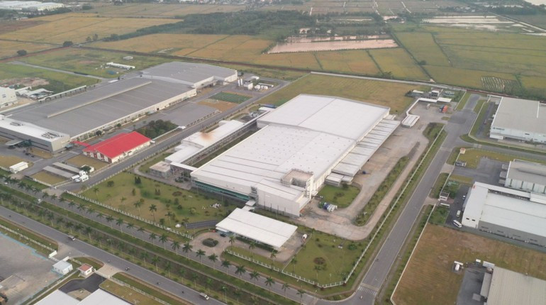 Many businesses not only invest in products, but also invest in people such as improving working conditions, protecting natural resources, and supporting local communities. (Photo: NDO) nestle2.jpg