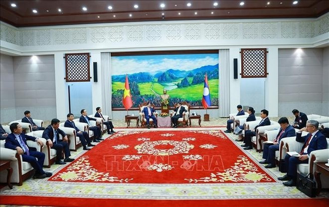 At the meeting between Prime Minister Pham Minh Chinh met with General Secretary of the Lao People’s Revolutionary Party (LPRP) and President of Laos Thongloun Sisoulith on December 3 afternoon. Photo: VNA