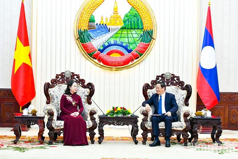 Vietnamese Vice President Vo Thi Anh Xuan and Lao PM Sonexay Siphandone. (Photo: Hai Tien) ndo-br-2.jpg