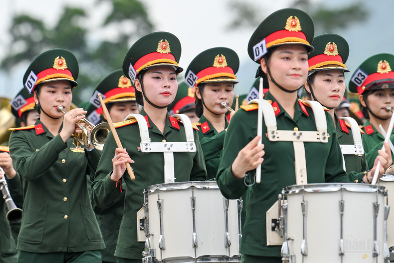 Leading the formation was the female military band unit.
