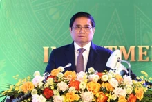 PM Pham Minh Chinh speaks at the investment promotion conference in Hoa Binh Province. 
