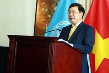 Deputy PM Pham Binh Minh speaks at the ceremony. (Photo: VGP)