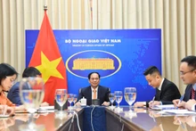 Minister of Foreign Affairs Bui Thanh Son holds online talks with Chinese State Councilor and Foreign Minister Qin Gang on March 28. (Photo: baoquocte.vn)