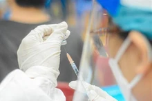 COVID-19 vaccination (Photo: VNA)