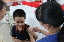 The total number of doses COVID-19 vaccines injected reached 259,463,342. (Photo: VNA)