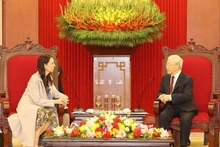 Party General Secretary Nguyen Phu Trong (right) receives Prime Minister of New Zealand Jacinda Ardern. (Photo: VNA)