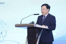Deputy Prime Minister Pham Binh Minh speaks at the forum. (Photo: VNA)