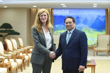 Prime Minister Pham Minh Chinh (right) receives USAID Administrator Samantha Power in Hanoi on March 10. (Photo: NDO)