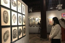 At the exhibition (Photo: VNA