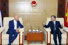 Minister of Public Security Gen. To Lam (R) and Dutch Ambassador to Vietnam Kees van Baar (Photo: VNA)