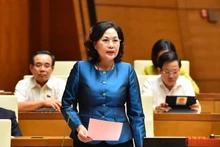 Governor of the State Bank of Vietnam (SBV) Nguyen Thi Hong speaks at the National Assembly’s question-and-answer session on November 3. (Photo: NDO)