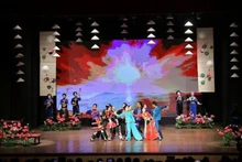 An art performance at the event (Photo: VNA)