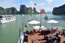 Enjoying the beauty of Ha Long Bay on a cruise is an excited experience. (Photo: CNN)