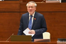 Chief Justice of the Supreme People’s Court Nguyen Hoa Binh speaks at the meeting. (Photo: NDO)