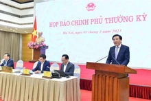 Tran Van Son, Government Spokesman and Minister - Chairman of the Government Office, speaks at the press conference on March 3. (Photo: VNA)