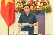 NA Chairman Vuong Dinh Hue delivers the opening speech of the NA Standing Committee's 15th meeting on September 12. (Photo: NDO)