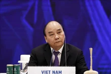 President Nguyen Xuan Phuca attends the second session of the 29th APEC Economic Leaders’ Meeting. (Photo: VNA)
