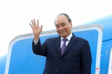President Nguyen Xuan Phuc at the Soekarno-Hatta International Airport in Jakarta, Indonesia (Photo: VNA) 