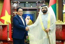 Prime Minister Pham Minh Chinh (left) and UAE Vice President and Prime Minister Sheikh Mohammed bin Rashid Al Maktoum. (Photo: VNA)