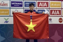 Swimmer Pham Thanh Bao sets a new SEA Games record in the men’s 200m breaststroke with 2 minutes 11 seconds and 45 (Photo: VNA)