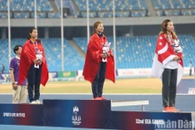 Runner Nguyen Thi Oanh (middle) (Photo: NDO)