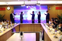 Delegates carried out the ribbon-cutting ceremony to inaugurate the e-portal.