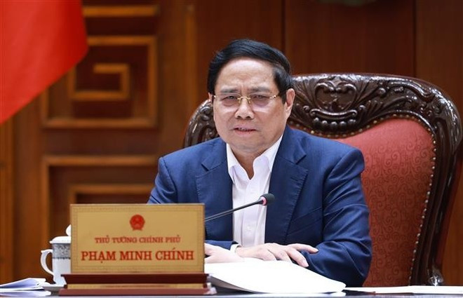 Prime Minister Pham Minh Chinh speaks at the meeting. (Photo: VNA) Prime Minister Pham Minh Chinh speaks at the meeting. (Photo: VNA)