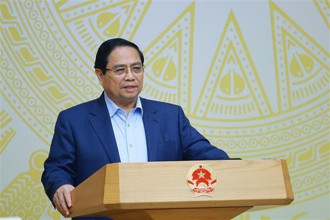 PM Pham Minh Chinh speaks at the meeting (Photo: VNA)