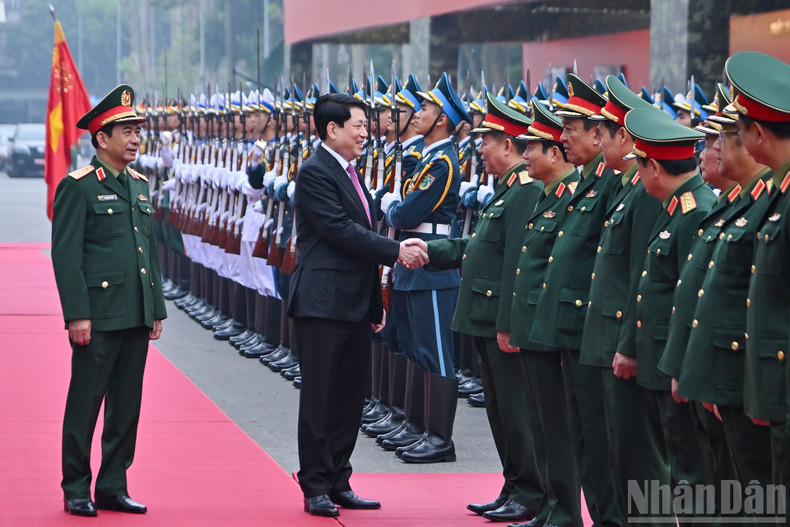 President Luong Cuong with leaders of the Ministry of National Defence at the conference.