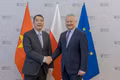 Deputy Minister Cao Anh Tuan and Polish Deputy Minister of Finance Jurand Drop. (Photo: Vietnamese Embassy in Poland)