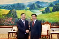 Standing Deputy Prime Minister Pham Gia Tuc (left) meets with Party General Secretary and President of Laos Thongloun Sisoulith in Vientiane on September 21, 2026. (Photo: VNA)