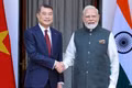 Prime Minister Le Minh Hung meets with Indian Prime Minister Narendra Modi. (Photo: VNA)
