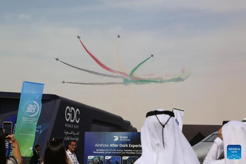 Aircraft perform during the 19th edition of the Dubai Airshow in Dubai, the United Arab Emirates (UAE), Nov. 17, 2025. The 19th edition of the Dubai Airshow opened Monday at Dubai World Central, featuring the Middle East debut of two of China's homegrown C919 aircraft. Organizers said the five-day event, held under the theme "The Future is Here," has drawn more than 1,500 exhibitors, including 440 first-time participants.