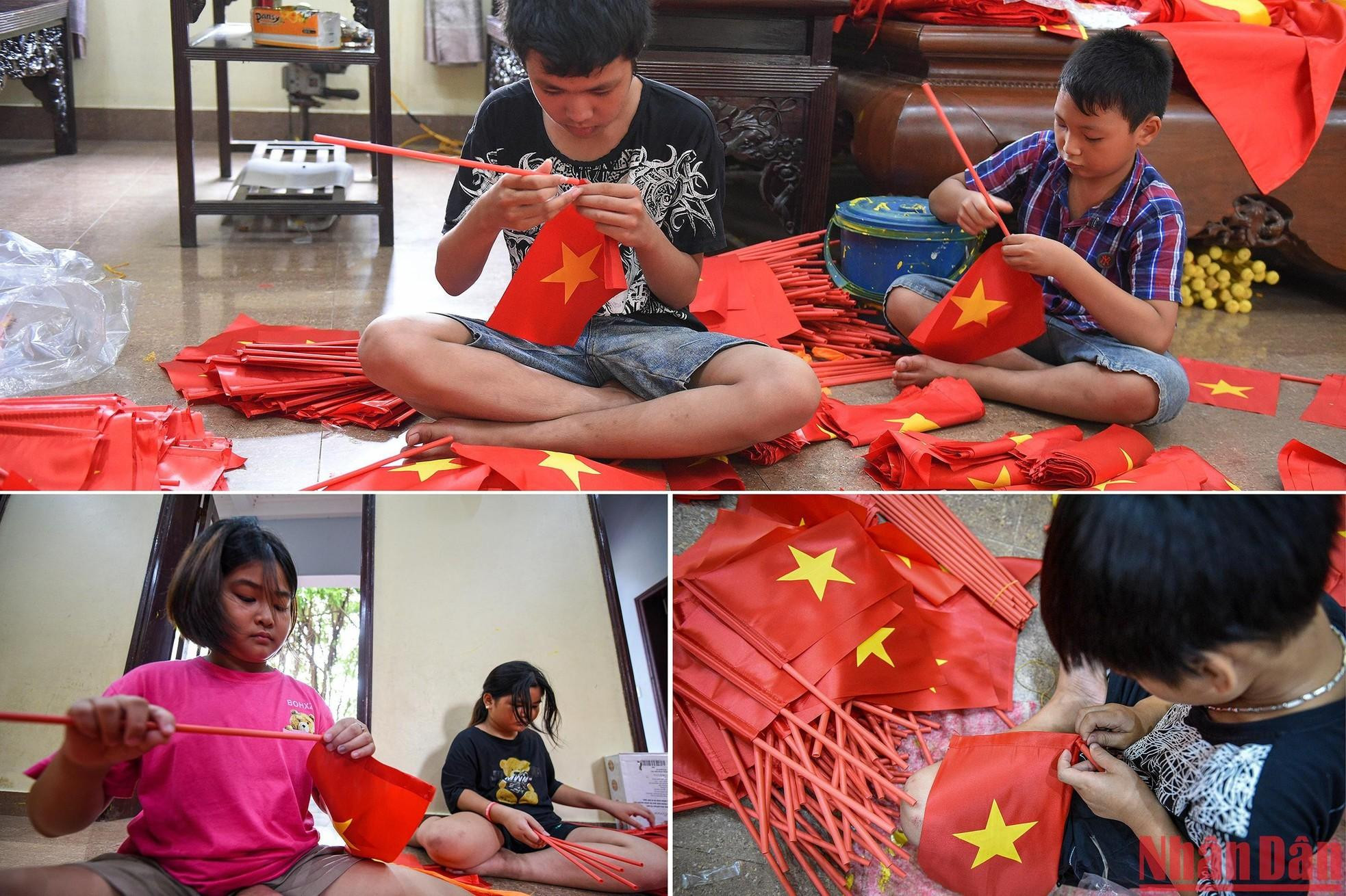 Children make small handheld flags. Children make small handheld flags.