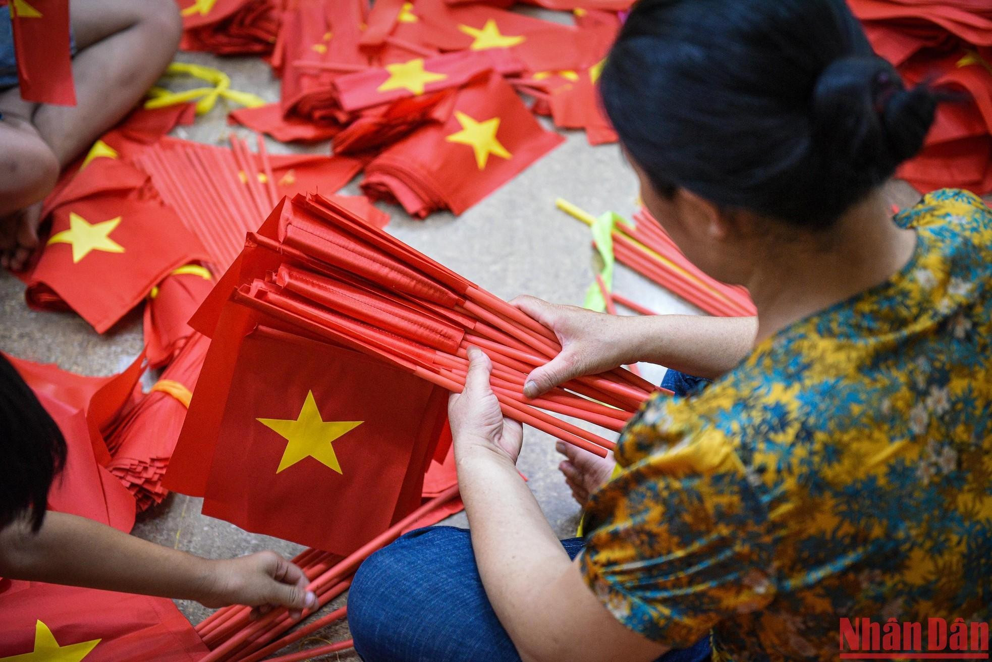 The village is busy with making flags to meet the increased demand during the National Day and the upcoming opening of a new academic year. The village is busy with making flags to meet the increased demand during the National Day and the upcoming opening of a new academic year.