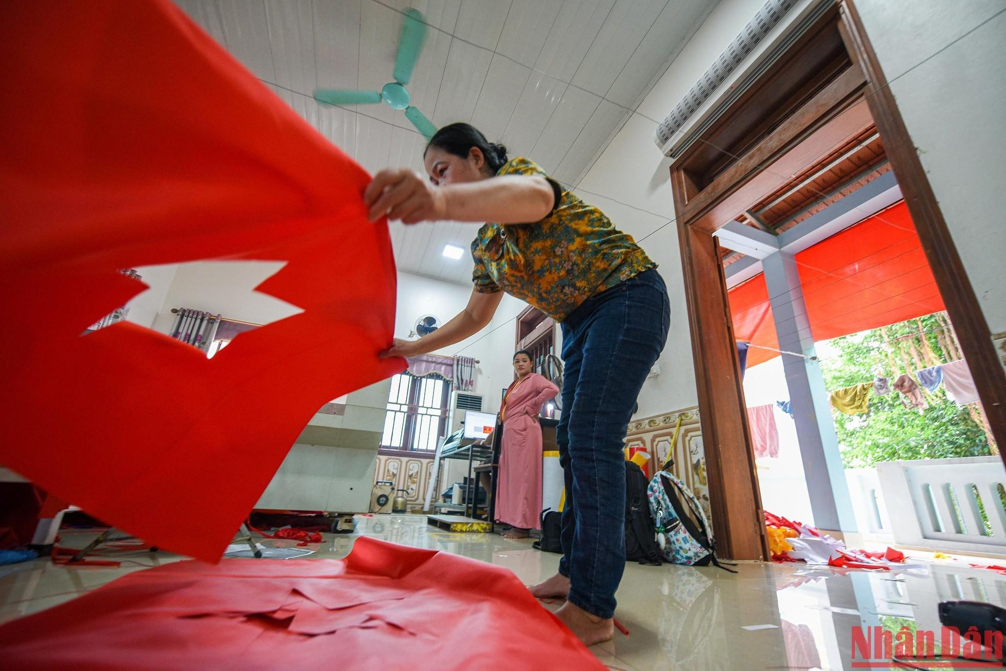 Many families in the village have been making flags for four generations. The job gives them both pride and income. Many families in the village have been making flags for four generations. The job gives them both pride and income.