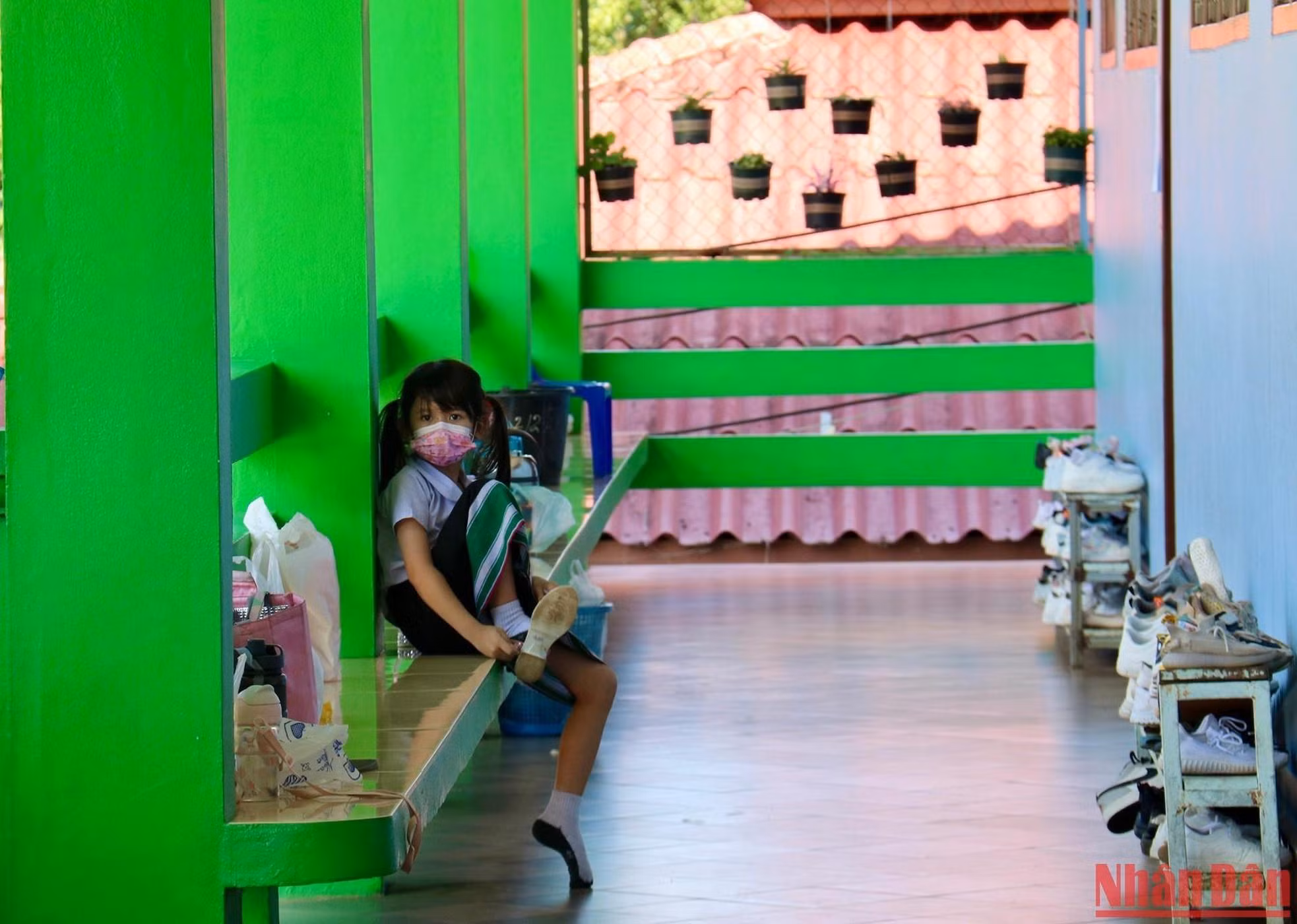 All students take off their shoes before entering the classroom to maintain hygiene.