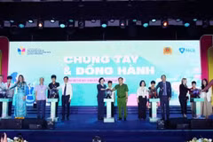 Delegates perform the launch ceremony.
