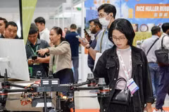 Visitors explore agricultural production equipment on display at Agri & Biotech Vietnam 2026 in Ho Chi Minh City. (Photo: VNA) 