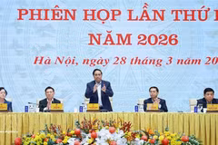 Prime Minister Pham Minh Chinh (centre) speaks at the meeting (Photo: VNA)