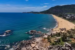 Ky Xuan Beach in Ha Tinh province features a long coastline, smooth sand and an unspoiled natural landscape. (Photo: VNA)