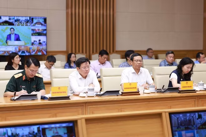 Delegates attend the meeting, (Photo: VNA)