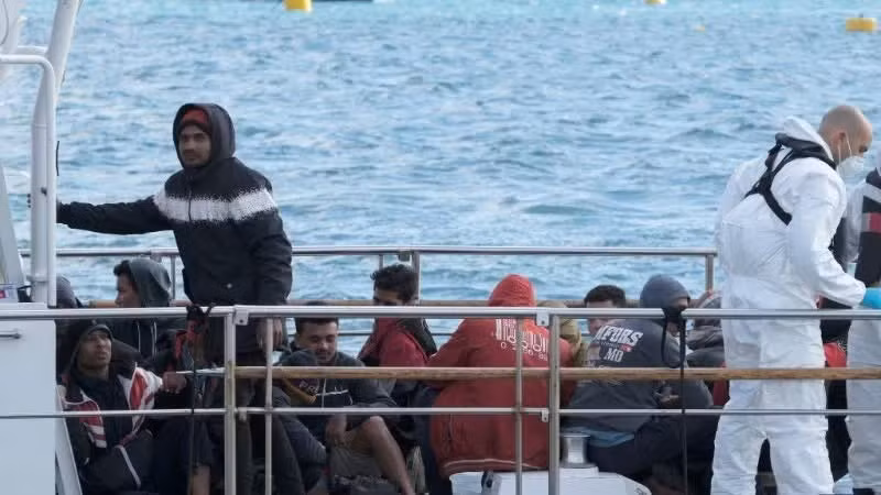 Migrants rescued at sea wait to disembark in Marsaxlokk, Malta, in April 2023. (Photo: Jonathan Borg/Xinhua)